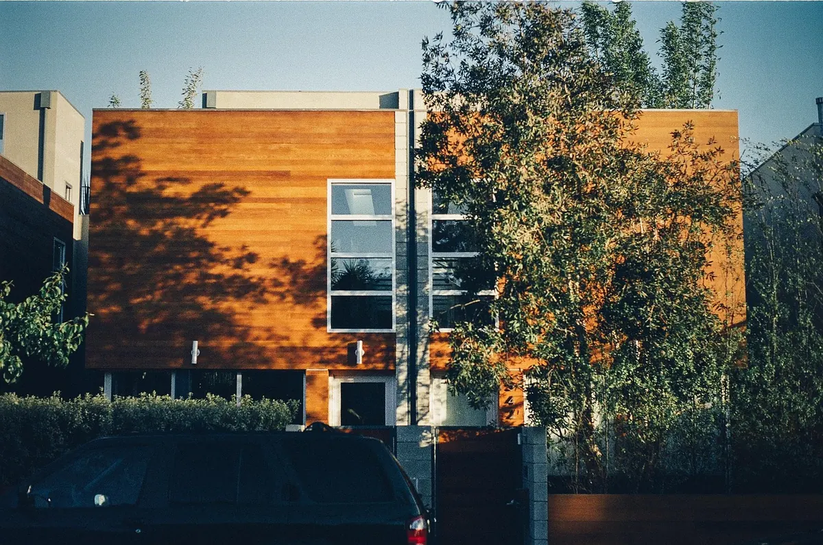 Larch for Cladding: A Practical Comparison with Cedar and Treated Pine